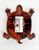 Sterling Plastic Turtle Pencil Sharpener - Brown, top view of a turtle-shaped brown plastic sharpener with a metal blade and white casing.