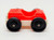 Fisher-Price Original Little People 1-Seat Garage-Style Car - Red Top White Base, toy car with black wheels and red roof.