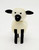 Fisher-Price Original Little People Sheep / Woolie the Sheep, a small toy sheep with a white body, black legs, ears, and nose, and black heart-shaped eyes, made of plastic with a smooth finish.