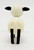 Fisher-Price Original Little People Sheep Woolie the Sheep, plastic toy sheep with black ears and legs on a plain white background.