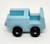 PLAYSKOOL Familiar Places and Friends #470 Rescue Center - Fire Chief Car, a light blue wooden toy fire truck with black wheels on a white background.