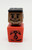 PLAYSKOOL Familiar Places and Friends African-American Blockhead with Chin, wooden toy block with a smiling face and black hair, stacked on top of a red block with a dog illustration.