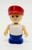 Playmates Li'l Playmates - Male with Blue Pants White Shirt and Red Hat, plastic toy figure with smiling face, wearing a red hat, white sleeveless shirt, and blue pants.