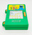 Tyco Sesame Street Cookie Monster's 1-2-3 Learning Machine, a vintage green electronic educational toy with Sesame Street branding and Cookie Monster graphic, featuring a screen displaying number and counting activities, and orange sliders on the sides.