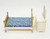 Fisher-Price Doll House Decorator Set #255 Bedroom, miniature dollhouse bedroom furniture with a white bed with gold accents and a blue floral mattress, and a white dresser with a mirror