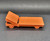 Fisher-Price Doll House (1978 - 1985) Lounge Chair, orange plastic miniature lounge chair with adjustable backrest and small wheels, designed for dollhouse furniture.