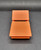 Fisher-Price Doll House (1978 - 1985) Lounge Chair, miniature orange plastic lounge chair with horizontal slat design.