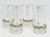 Libbey Glass Company Libbey Christmas Green and Red Holly Beer Mug Set of 4, clear glass beer mugs with festive holly and red ribbon design near the base.