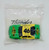 Paramount Days of Thunder 1990 #46 City Cole Trickle 1/64 Promo Car, miniature diecast model in yellow and green with signature on the hood, inside a clear plastic bag.