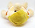 NANCO 1989 The Flintstones 16" Barney Rubble Plush, a soft stuffed toy of Barney Rubble from The Flintstones in a lying position with a yellow shirt and fluffy cream-colored fur.