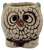 Vintage ivory ceramic owl candlestick holder with large black eyes and brown feather details