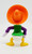 McDonald's Happy Meal toy of Donald in Mexico from the 1994 Mickey & Friends Epcot Adventure. The PVC toy figure of Donald Duck is wearing and orange sombrero with a green and purple top. The series contained 8 different Disney characters dressed in different countries cultural outfits and was available July 8 - August 4, 1994.