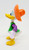 McDonald's Happy Meal toy of Donald in Mexico from the 1994 Mickey & Friends Epcot Adventure. The PVC toy figure of Donald Duck is wearing and orange sombrero with a green and purple top. The series contained 8 different Disney characters dressed in different countries cultural outfits and was available July 8 - August 4, 1994.