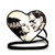 Sleepyville Critters Glow in the Dark Heart Shape Frankenstein & Bride Backpack, a cute Halloween accessory featuring a black and white illustration of Frankenstein and Bride inside a glowing heart-shaped design with a black strap.