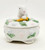 McCrory Corp. McCrory Easter Bunny with Carrot Ceramic Trinket Box, a white ceramic box featuring a bunny holding a carrot on top with floral and leaf decorations.