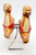Empire Vintage Empire Hard Plastic Christmas Reindeer Tabletop Decoration, standing reindeer figures with red harnesses on metal stand, used as Christmas holiday decor.