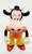 ARCO Toys ARCO Disney Clarabelle Cow 5.5" Toy Figure, colorful cartoon character toy with cow features, wearing yellow pants, red shoes, and an orange shirt.