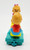 McDonald's Happy Meal Toy 1994 Ronald McDonald's Happy Birthday #6 Berenstain Bears, colorful plastic figurine of two children facing each other, with one with blond hair and another with curly orange hair, sitting on a small yellow bench.
