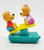McDonald's Happy Meal Toy 1994 Ronald McDonald's Happy Birthday #6 Berenstain Bears, vintage plastic toy of two bears on a seesaw, with one bear in a red shirt and blue pants, and the other in a pink dress, set against a plain white background.