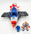 Fisher-Price® Imaginext® 2014 Alpha Star, a toy spaceship with a blue cockpit, black wings, red tail fins, and an orange propeller, along with a figure of a boy in white and orange space armor and a small blue and white robotic companion.