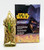 Kurt Adler 2005 Star Wars Yoda Hand-Crafted Glass Holiday Ornament, gold-colored glass ornament featuring a detailed Yoda design with a hanging loop.