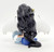 The Hamilton Collection 2019 Perfect Romance Blue Willow Beauty Collection, a detailed ceramic figurine of a woman with long black flowing hair, angel wings, and blue clothing, holding a tiny angel.