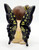 The Hamilton Collection Butterfly Wishes Collection Soaring Dreams, decorative butterfly with black wings and yellow markings perched on a woman with flowing brown hair.