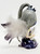 The Hamilton Collection 2014 Enchanting Companions Midnight Dream, a detailed collectible figurine featuring a fairy with feathered wings, a large urn, and a purple and black dress.