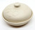 Sassafras 1993 Superstone Baker Chestnut Roaster, a vintage off-white ceramic chestnut roaster with a lid, featuring a subtle embossed motif of chestnuts and the brand name.