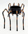 Unbranded Halloween Black and Orange Metal Spider Tea Light Votive Candle Holder, spider-shaped candle holder with a black bowl and orange and black striped legs.