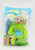 Burger King Kids Club 1999 Teletubbies Clip-on Beanbag - Dipsy, plush toy of Dipsy from Teletubbies in bright green costume with a blue pocket, inside clear packaging with colorful Teletubbies and Burger King branding.