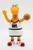 Kraft Cheesasaurus Rex USA Basketball PVC Toy Figure, cartoon dinosaur with basketball, USA logo, red and white sneakers, sports outfit.