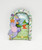 Disney 2016 Epcot International Flower and Garden Festival Figment Magnet, colorful magnet featuring Figment holding a flower pot with a scenic background of Epcot's spaceship Earth and fairy tale characters.