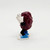 California Raisins Hardee's Wave 1 Hush Figure, collectible figurine of a raisin character with a white glove, black pants, blue shoes, and a white hand, in a dynamic pose.
