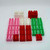 MEGA BLOKS Mattel MEGA BLOKS Lot of 25 Blocks, colorful plastic building blocks in pink, white, red, and green, arranged on a white background.