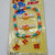 Famus Corp Famus Toys 1986 American Girl Jewelry set, colorful necklace, earrings, and barrettes with cartoon image of a girl with red hair, in original packaging.