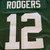 NFL Green Bay Packers #12 Aaron Rodgers Nike Jersey, close-up of the green jersey with large white number 12 and 'RODGERS' on the back.