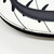 COMECO INC Glow in the Dark White Jack O Lantern Shoulder Bag - Used, close-up of the black strap and part of the white bag surface with glow-in-the-dark design and minor damage.