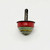 Gibbs Vintage Gibbs Tin Litho Toy Top, vintage metal spinning toy with red, green, yellow, and black painted design, showing signs of wear and age.