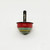 Gibbs Vintage Gibbs Tin Litho Toy Top, vintage tin toy spinning top with colorful red, green, and yellow painted design and a black handle.