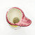 Unbranded Vintage Porcelain Small Boy With Hat 3.5-inch Vase, top view showing a red rim and inner white surface with some dirt marks.