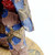 Coca-Cola Stanton Arts 1997 Coca-Cola "Big, Big Taste" With Emmett Kelly Limited Edition Figurine, close-up of the textured and colorful figurine featuring blue, gold, and pink details.