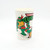 Mirage Studios Peter Pan Ind 1989 Teenage Mutant Ninja Turtles Plastic Cup, featuring colorful cartoon characters of the Teenage Mutant Ninja Turtles on a white background.