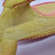 Dor Mei 1986 Edaphosaurus Rubber 15" Toy Dinosaur Figure, close-up view showing the textured yellow and pink rubber surface with embossed details.