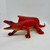 Dor Mei 1986 Edaphosaurus Rubber 15-inch Toy Dinosaur Figure, red rubber toy dinosaur with textured skin, open mouth, and blue eyes, standing on a white background.