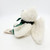 Boyds Bears Charity Angelbeary, plush white teddy bear with a black ribbon and green leaf detail, lying on a white background.