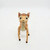 McDonald's Happy Meal toy figure of Bambi with butterfly on tail from the 1988 Disney Classic Bambi series.  The figure has legs that move forward and backwards.  Bambi's head moves side to side and stands 3-inches tall.