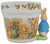 Teleflora 1997 Beatrix Potter Peter Rabbit Ceramic Planter, decorative ceramic planter featuring Peter Rabbit with a garden scene and a rabbit figurine attached.