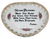 Porcelain wall hanging heart shaped plate with "House Blessing".  The plate has scalloped edge with small hearts with gold trim on edge.  The plate is 7-inches wide by 7-inches long.