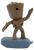 McDonald's Happy Meal Toy of Groot from the 2023 Marvel Studios Guardians of the Galaxy Vol. 3 series of bobbleheads. Groot is standing on a grey plank and was one of 8 different character toys from the movie. The toys were available at McDonald's from April 25th to May 22nd to tie-in with the film's release.